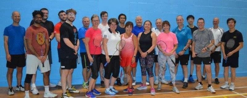 Club members lined up against the sports hall wall